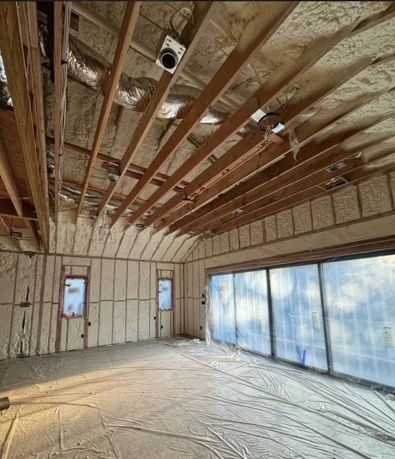 Interior walls and ceiling insulated with spray foam during new construction in Fort Riley